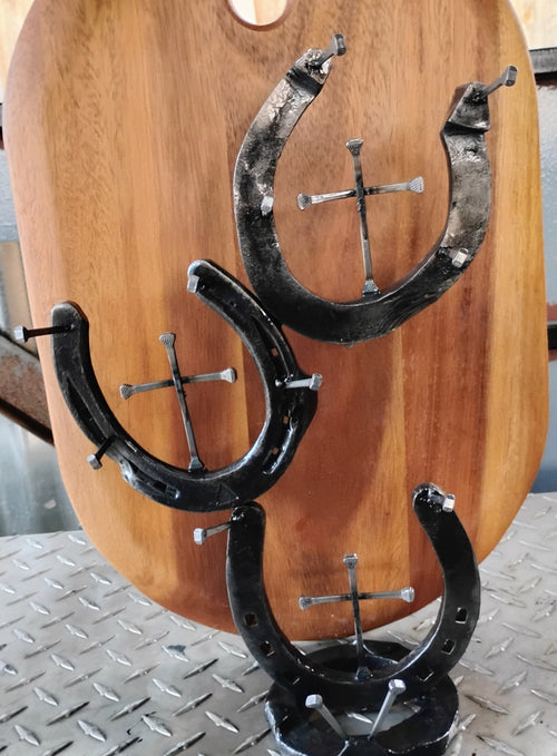 Handmade horseshoe jewelry holder with crosses welded to center of each shoe — rustic Western Christian décor handcrafted in Montana

