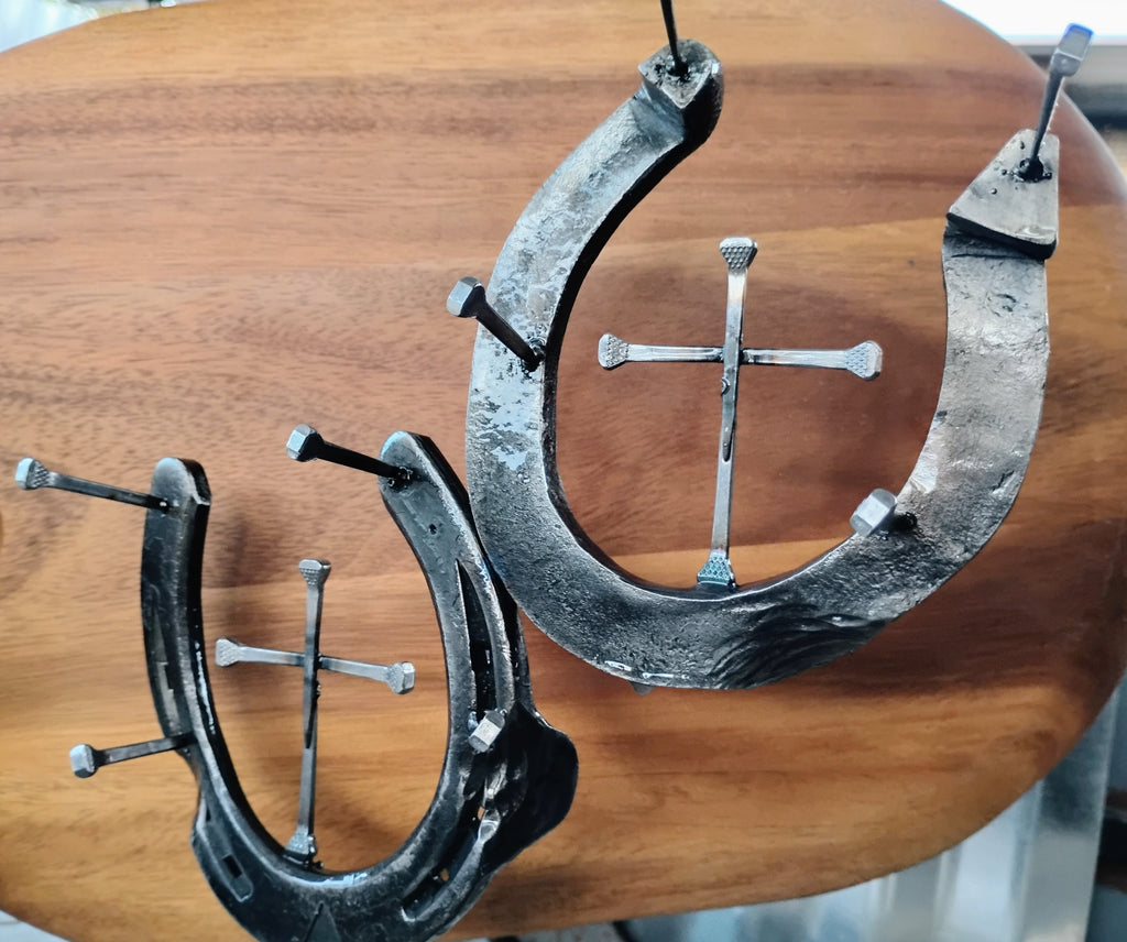 Handmade horseshoe jewelry holder with crosses welded to center of the shoe — rustic Western Christian décor handcrafted in Montana
